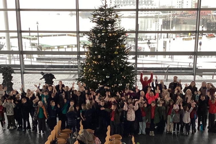 the pupils were delighted to see the Senedd’s Christmas tree and have their photograph taken in front of it
