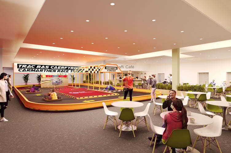 An artist impression of the new Carmarthen Health and Wellbeing Hwb that is under construction at the former Debenhams building in Carmarthen. Pictured is how the family entertainment area on the first floor will look.