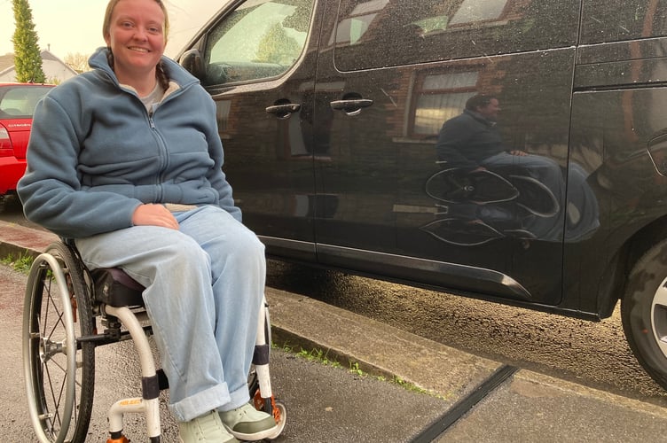 Lauren Francis next to her electric van - the Kerbo Charge gulley is the black strip (pic Richard Youle and free for use for wire partners) 