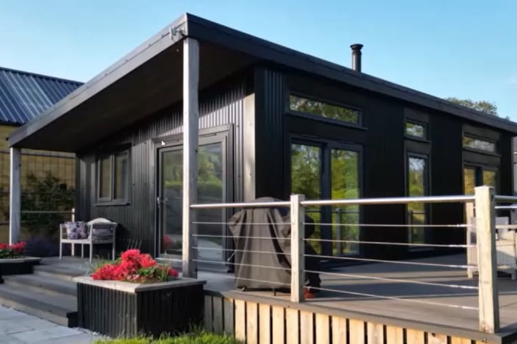 Permission for the continued use of a mobile unit with a veranda as tourist accommodation was sought at Cresswell Barn Farm.