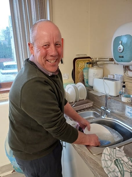 FUW President Ian Rickman doing the dishes - FUW Farmhouse Breakfast Week