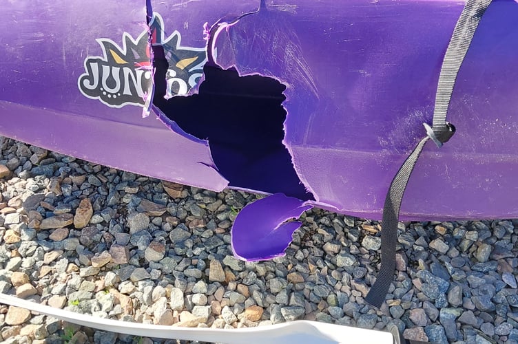 Damage to the kayak after the crash. // This is the moment a speedboat driver crashed into a 15-year-old kayaker with a vessel full of passengers. Adam Russell, 28, was given a 12-month prison sentence, suspended for two years, for the incident on August 11, 2024, on the River Cleddau in Wales. Swansea Crown Court heard how the crash, near Milford Haven in Pembrokeshire, wrecked the teenage boy's one-person kayak. The unnamed victim was left with cuts and bruising to his arms and lower lip - and has not returned to water sports since the 'terrifying' incident.