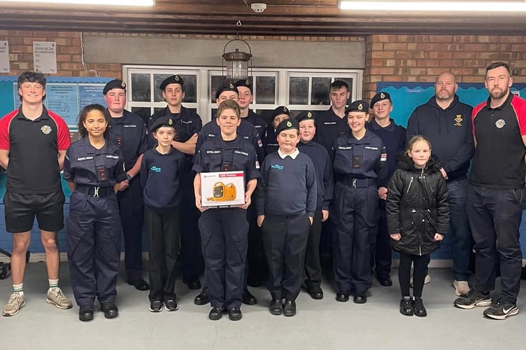 Tenby Sea Cadets enhance training with the donation of a new AED from Tenby Round Table, improving life-saving skills.
