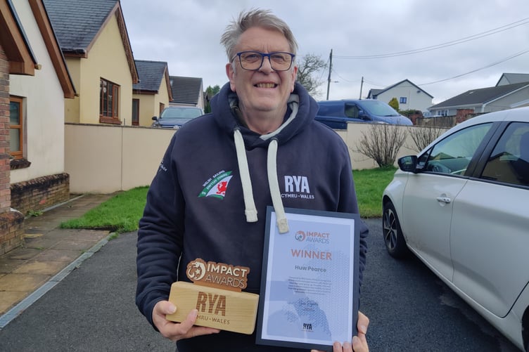 Huw Pearce with his RYA Cymru Wales Impact Award