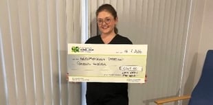 Fire walk raises £1,545 for neurophysiology department