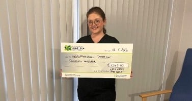 Fire walk raises £1,545 for neurophysiology department