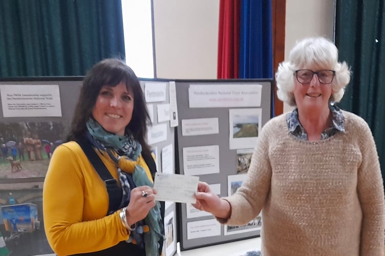 PIctured right Pembrokeshire National Trust Association Chairman presenting the cheque to Rhian Sula, 'General Manager' for the National Trust Pembrokeshire & Carmarthen Bay Portfolio. 