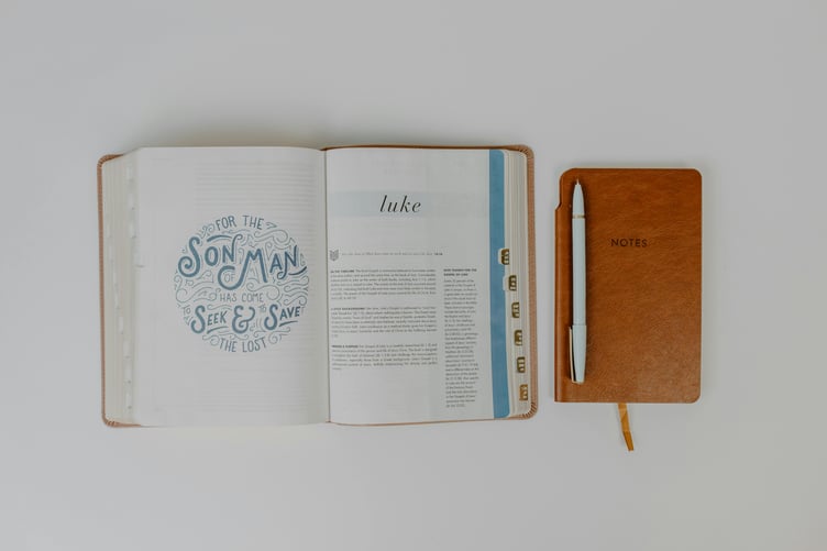 Illustrated Bible and notebook