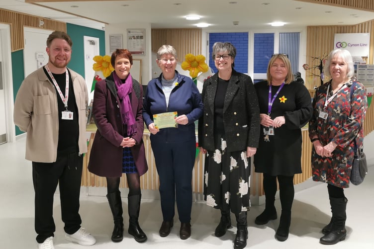 Cabinet Secretary for Social Justice, Jane Hutt; Older People's Commissioner for Wales, Rhian Bowen-Davies; pictured with Daisy Cole, Stuart Morgan, Karen Davies and Lynda Chandler of Age Connects Morgannwg at Cynon Linc 18th February 2026.