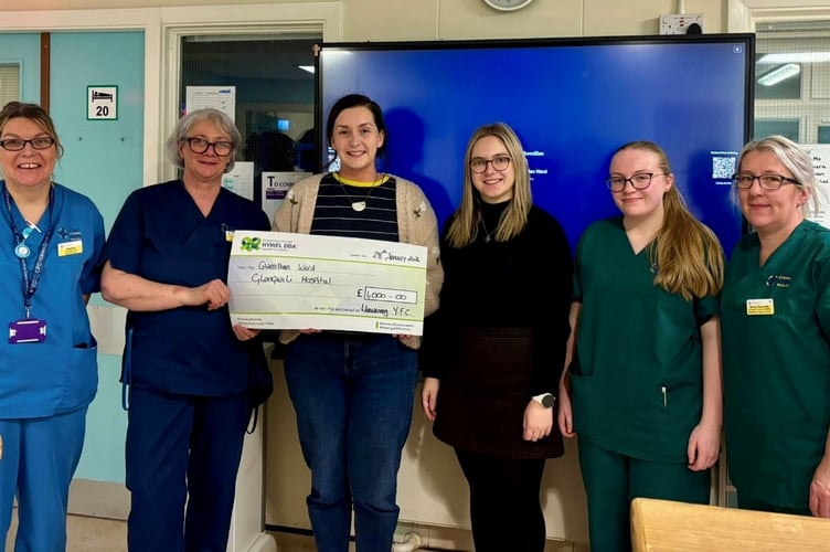 Pictured above: Llanwenog YFC members Gwawr and Briallt, and Gwenllian Ward staff members