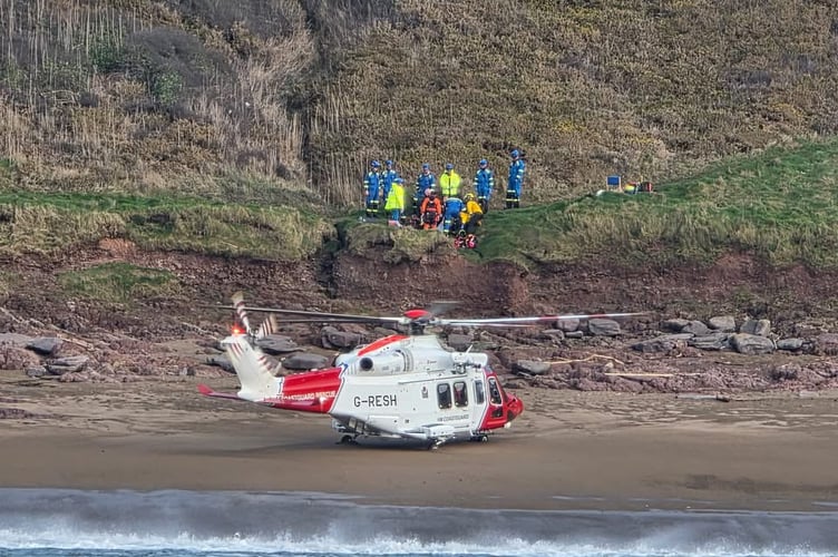 Once on scene, the helicopter landed on the beach and the casualty was loaded, along with Paramedics and then dropped close to the ambulance on the headland above.