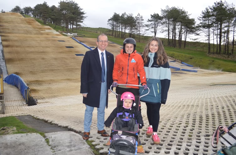 Ashmole & Co Partner, Jim Cornock, with Mabli and her mum Gwenno and Mabli’s physiotherapist and ski instructor, Mia Martin, at the Ski4All base in Pembrey