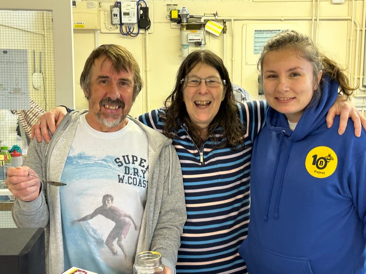 Rich Caville, Anne Draper and Lauren Smith at the hatch in Tenby’s Augustus Place Community Hall