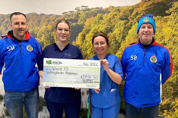 Stuart and Simon from New Hedges Saundersfoot Utd, with staff from Ward 10.