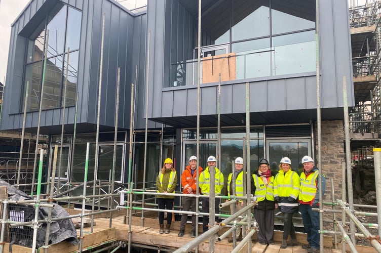 Caption: Checking out the progress on the Henry Tudor Centre. 