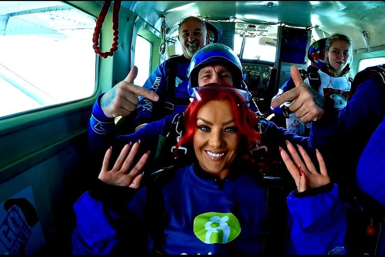 Philippa Langley doing a tandem skydive for Tŷ Hafan Children's Hospice over Swansea Airfield last year (2025)