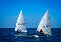 Tenby Sailing Club dinghies test limits in 26‑knot gusts