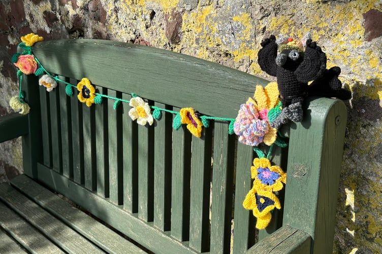Yarnbomber creations brighten up the seat at Penally