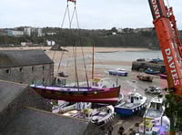 Tenby harbour boat lift kicks off holiday season