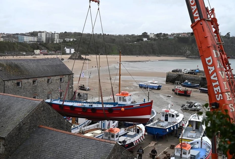 Tenby harbour boat lift kicks off holiday season
