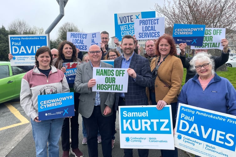 Photo Caption: Welsh Conservative candidates Paul Davies, Samuel Kurtz, Claire George, Brian Murphy, Gill Evans and Claire Jones launched their Ceredigion Penfro Senedd campaign today 2nd April with a commitment to protect local Health Services. 
