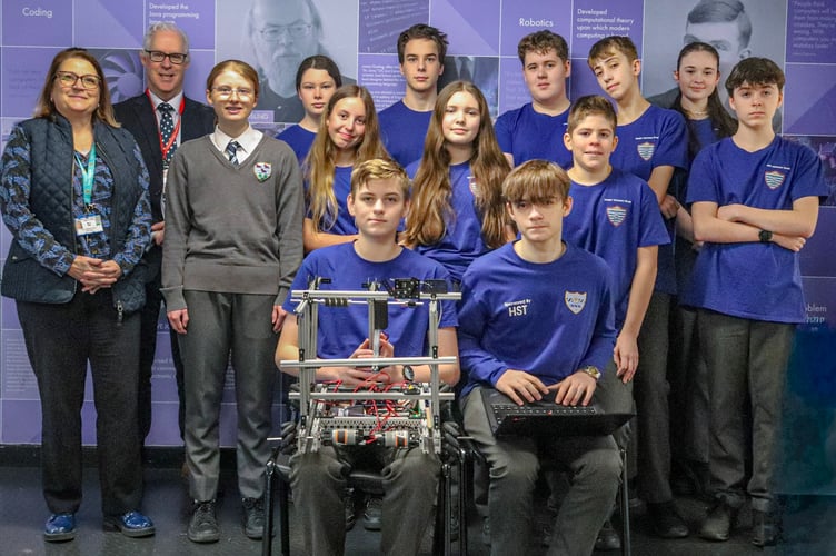 Refinery Public Affairs Manager Stephen Thornton is pictured with members of YG Ysgol Greenhill Techno Team as they prepare for this year’s FIRST Tech Challenge.