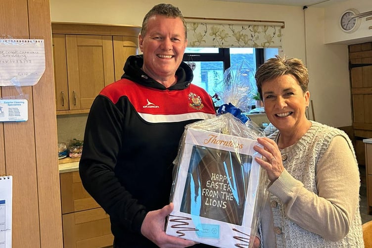 Jane Gibby, winner of the Easter Egg raffle in aid of Pembroke and Pembroke Dock Lions, who are great supporters of the club