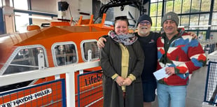 Couple rescued by Tenby RNLI donates in gratitude