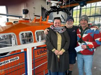 Couple rescued by Tenby RNLI donates in gratitude