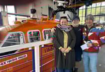 Couple rescued by Tenby RNLI donates in gratitude