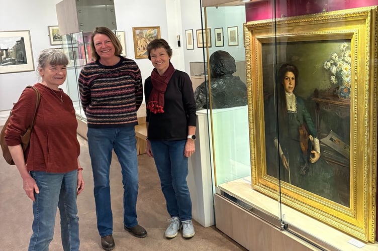 Sarah Eastlake, Beth Rich, and Jill Ramsay, visited Tenby Museum over Easter to view the E. J. Head oil painting of their relative, Betty Domleo (later Betty Eastlake).