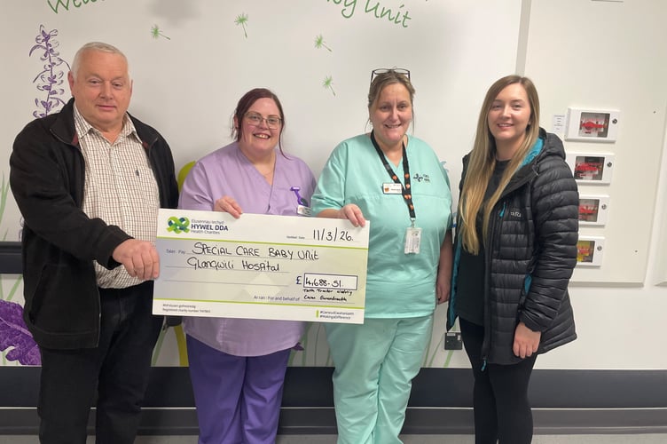 Nigel Davies, a staff member from SCBU, Sioned James and Anwen Davies.