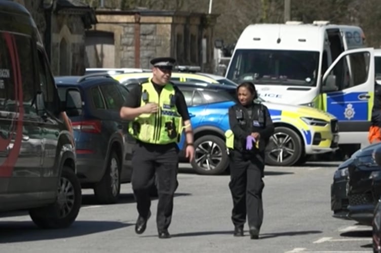 Police on patrol at Tenby railway station the day after the stabbings.