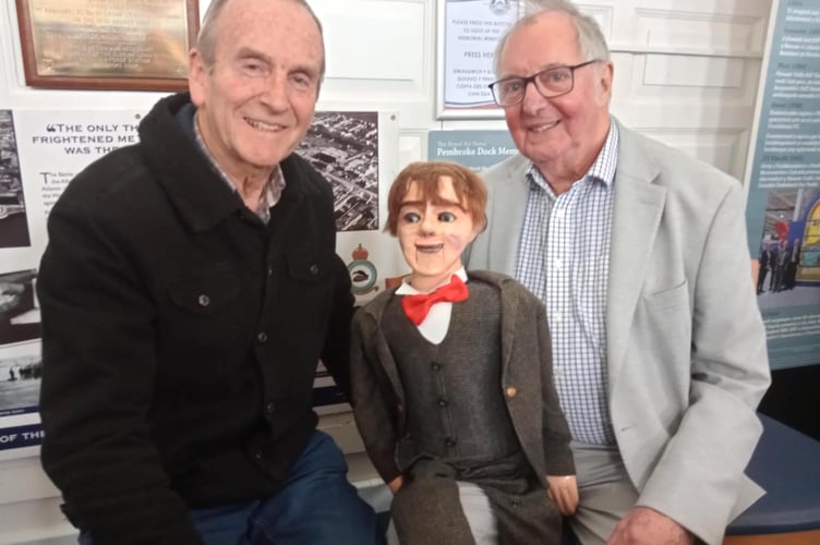 Paul Elliott and Gerald Williams with Charlie’ - the 100-year-old ventriloquist’s doll.