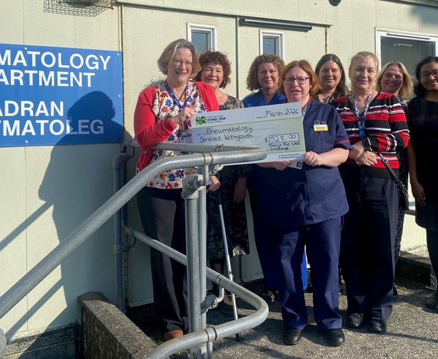 Tracy's daring firewalk raises £528 for Withybush Hospital