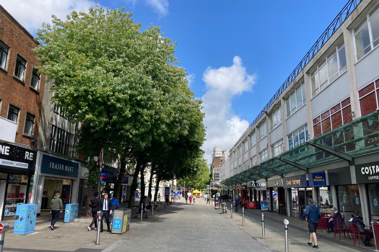 A project called Swansea Solar aims to install solar panels on unused flat roofs in city centre streets like Oxford Street, pictured (Richard Youle and free for for for all BBC wire partners)