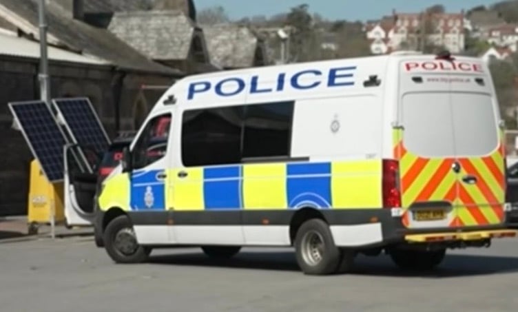 Police at the scene of Tenby Railway Station the following morning.