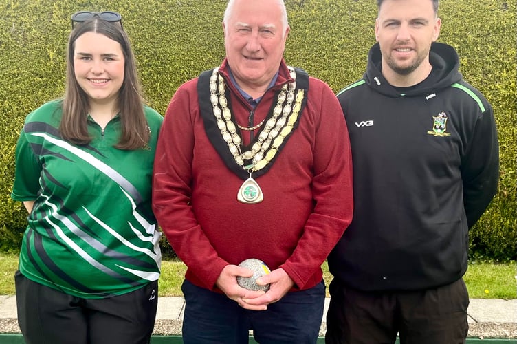 
Mayor of Whitland, Clr. Len Shipton, with club captains Katie Dickinson and Liam Price. 