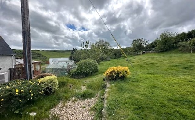 Dr Amanda John sought permission for ancillary accommodation in the rear garden of Cwmderi, Llanrhian.