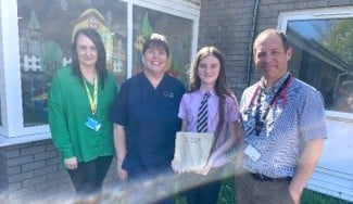 Seren with staff from the service