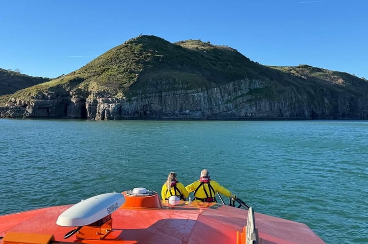 Both Tenby RNLI lifeboats responded quickly to rescue two individuals stranded by the tide at Gilman Point, dropping them safely ashore at Pendine.
