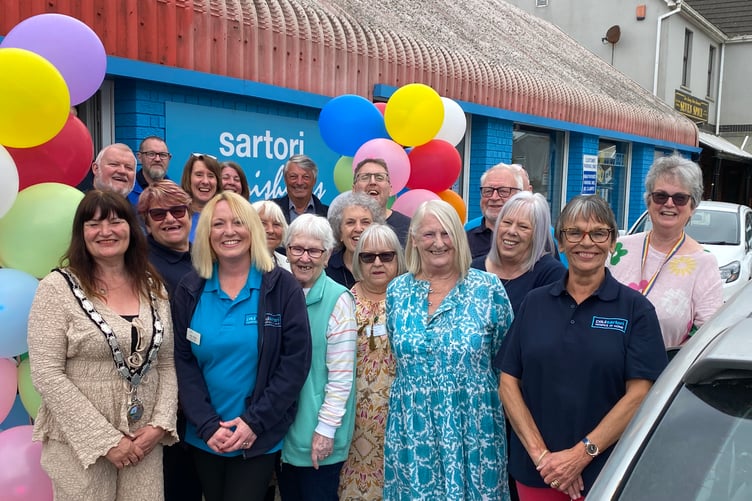 Smiles all round at the Grand Opening of the newly extended Paul Sartori Store in Pembroke Dock