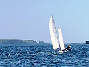 Thrilling dinghy races in Tenby's gusty conditions