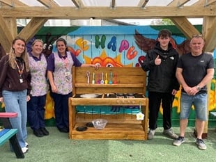 Student builds play equipment for hospital