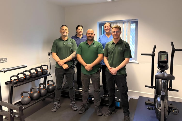 Cwm Seren staff with the new gym equipment