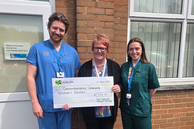 Pictured above: CCNS Staff with Lisa Cockroft
