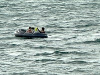 Tenby RNLI rescues two from deflating dinghy