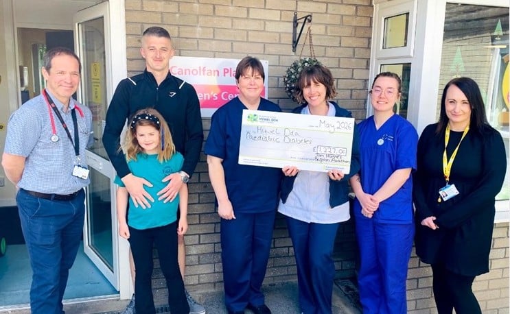 Tom and Scarlett Hughes with staff from the Paediatric Diabetes Team