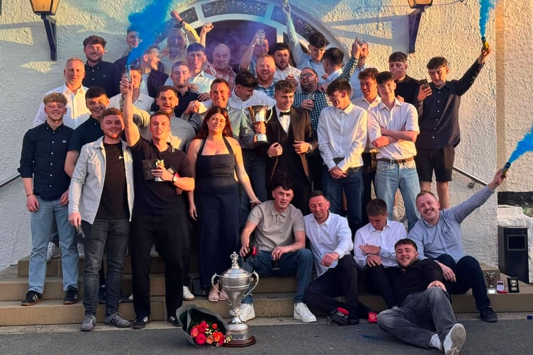 The players celebrate at the award presentations