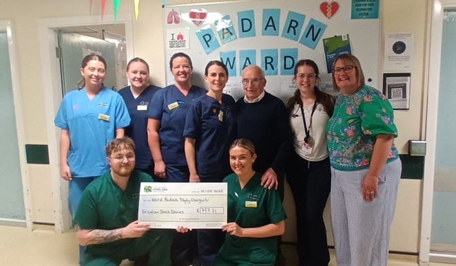 Staff from Padarn Ward with Mr Hugh Davies and his daughter, Mrs Elin Harris.